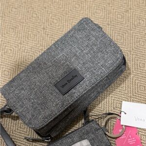 New with tags Vera Bradley cross body wallet.